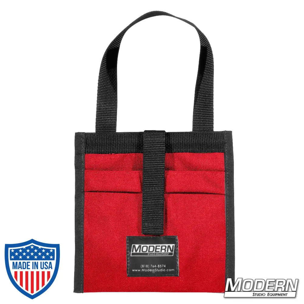 Modern red Cordura 1000 scrim bag for 5" lighting scrims with sewn-in stainless steel rod, ideal for film grip and rigging organization.