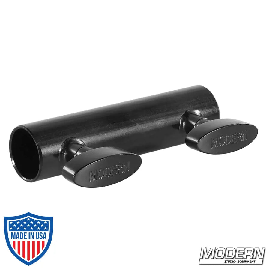 Black zinc sleeve with T-handles for 1-inch round pipe, ideal for film grip and rigging with Speed-Rail® couplers.