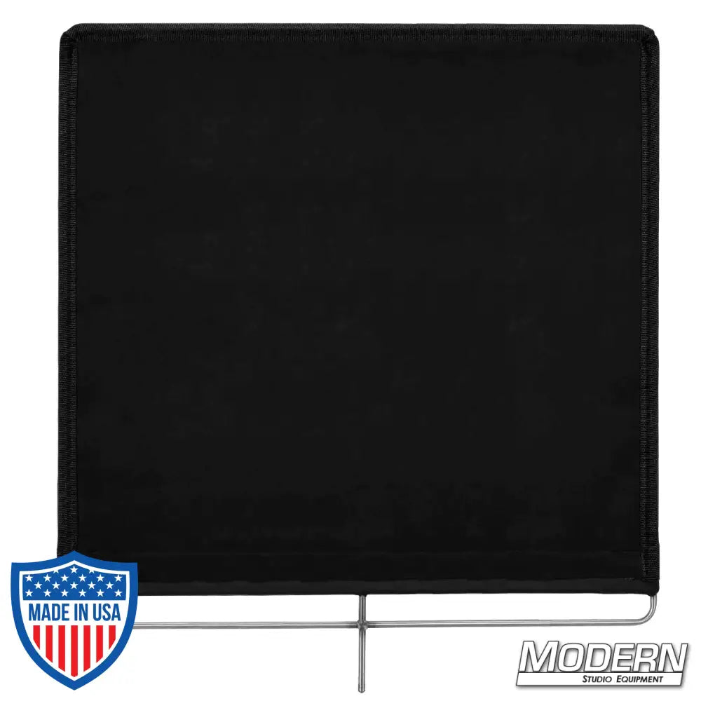 Solid flag with stainless steel frame and 16 oz. Commando cloth for film grip and rigging. Modern Studio Equipment branding.
