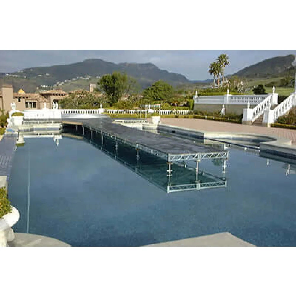 Steel deck platform over a pool with scenic mountain view in the background. Ideal for film grip and rigging needs.