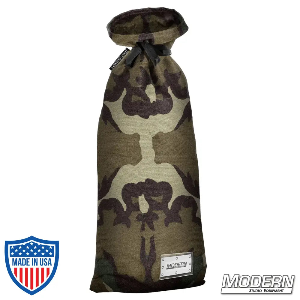 Extra large camouflage storage bag for film grip and rigging, featuring nylon cord for easy tying and plastic sleeve for labeling.