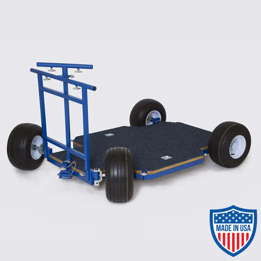 Western Dolly with push bar, pull handle, and pop-off wheels for film grip and rigging.