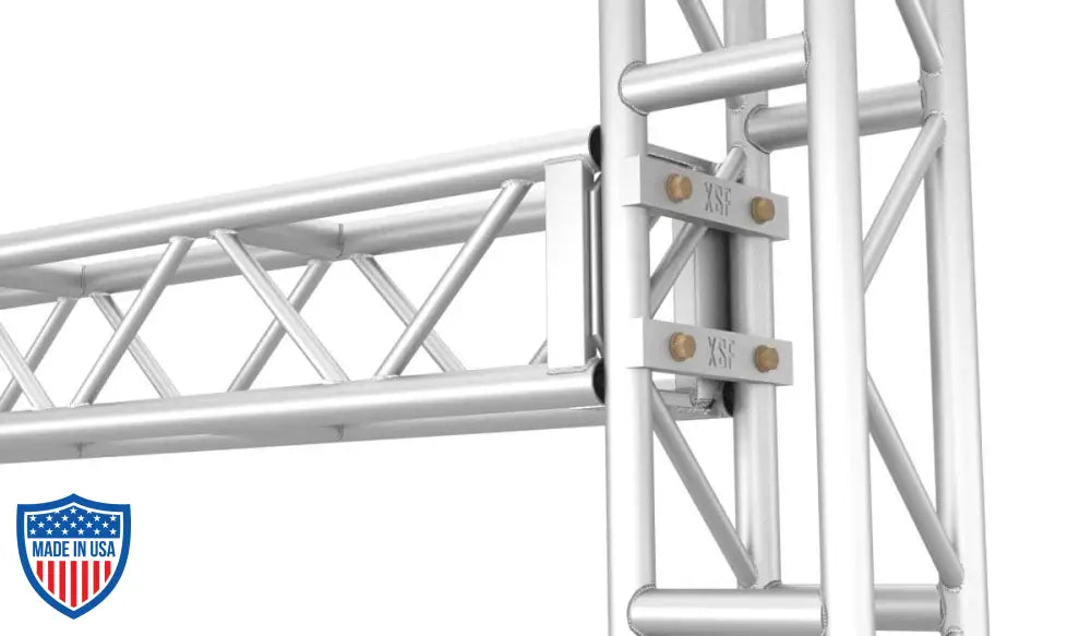 XSF Pinch Block connecting aluminum trusses for film grip rigging setup.