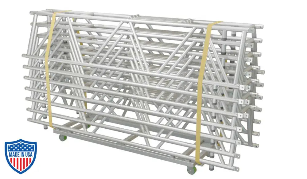 XSF Truss Dolly with strapped aluminum trusses, ideal for film grip rigging, stacks trusses safely up to 96 inches high.