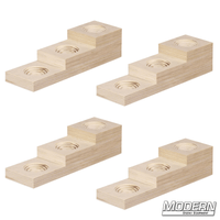 Set of four 3-step wood blocks for rigging and elevation on film sets, measurements 1", 2", 3" heights and 4" x 3.5" dimensions