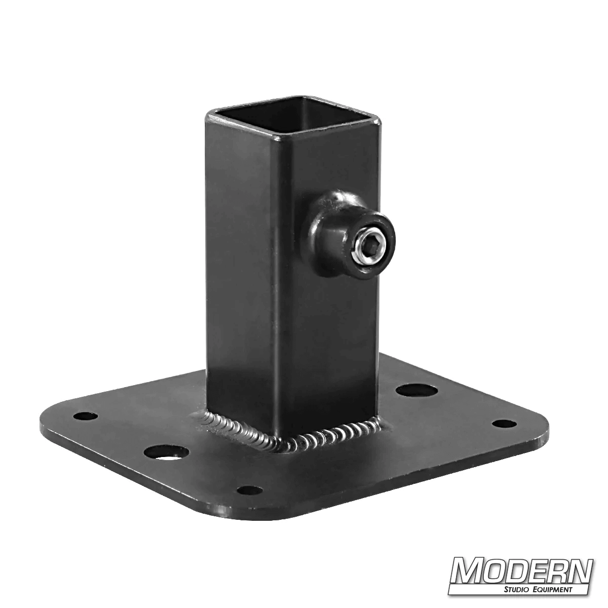 Black zinc flange base for 1-inch square tube with set screws, used in film grip and rigging to add strength and support to frames.