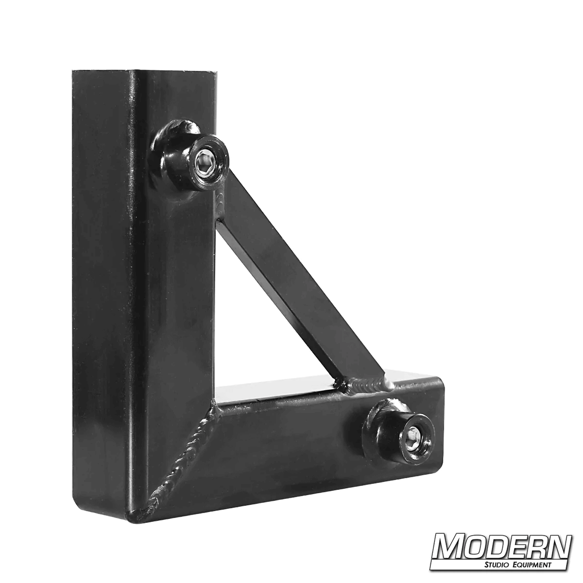 Black zinc corner fitting with set screws for 1-inch square tube, used in film grip and rigging for creating 90º frame corners.