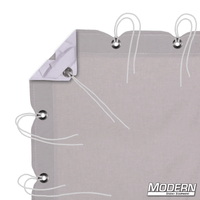 Gray muslin textile with grommets and ties for film grip rigging, corner elastic, shown with attached storage bag.