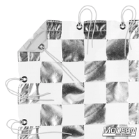 Silver and white checker pattern textile with webbing, grommets, ties, and elastic corners for film grip rigging, includes storage bag.