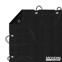 Solid black slip cover with webbing, grommets, ties, and elastic on all sides. Comes with storage bag. Film grip rigging equipment.