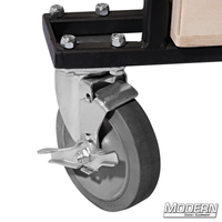 Close-up of front swivel caster with locking brake on Large Grip Cart for film grip and rigging equipment.