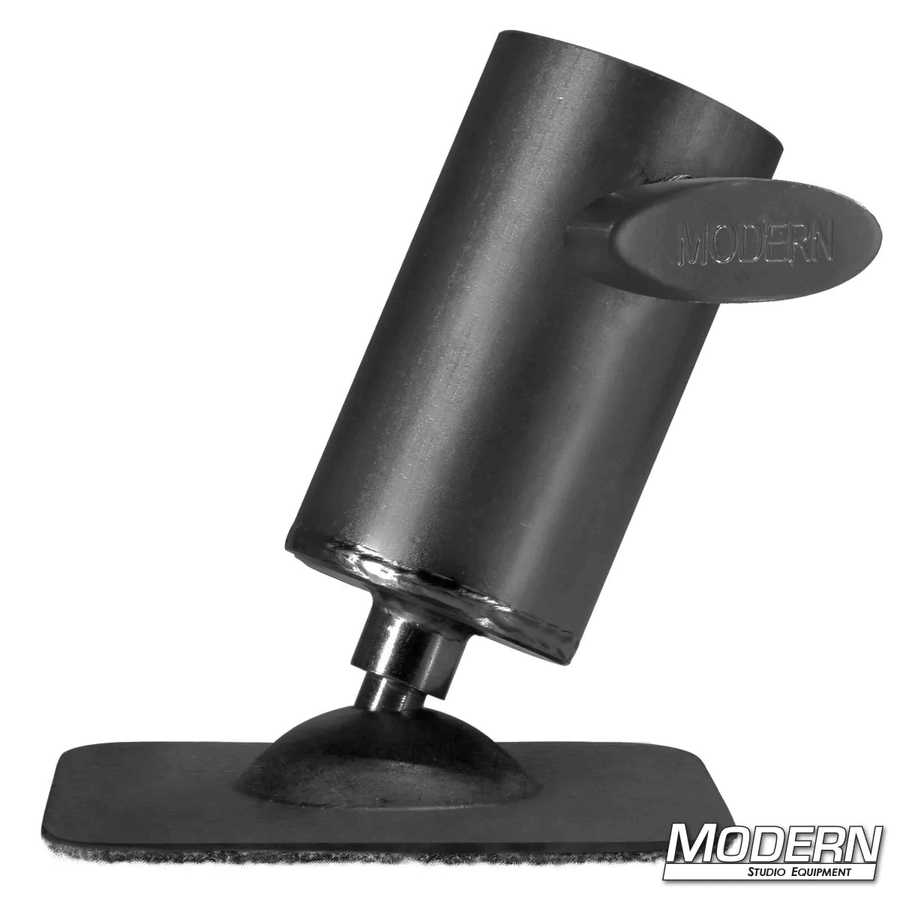 Black zinc pipe flange base with swivel and T-handle for 1-1/2-inch speed-rail, designed for film grip rigging, shown on flat plate.